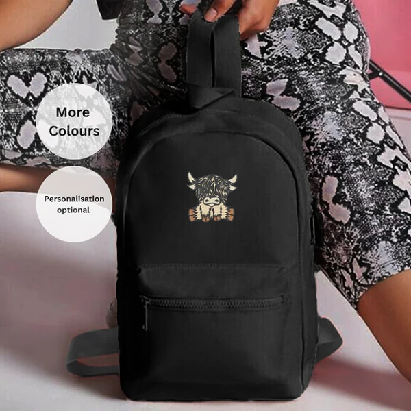 Scottish Highland cow backpack, embroidered mini rucksack, cow lover accessory, stylish embroidered bag, Highland cow gift idea, unisex animal-themed backpack, colorful mini essential bag, practical embroidered rucksack, countryside-inspired fashion, unique cow lover gift.