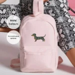 Dachshund embroidered backpack, sausage dog rucksack, dog lover accessory, dachshund gift idea, embroidered dog bag, stylish dog-themed backpack, unisex dog lover bag, colourful rucksack, dachshund design bag, cute dog backpack, mini essential fashion bag, pet lover accessory, sausage dog embroidered gift.