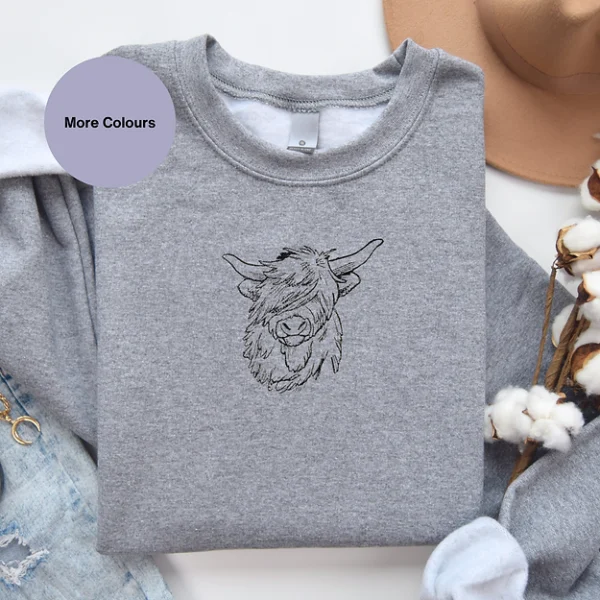 Scottish Highland Cow Embroidered Sweatshirt featuring a detailed center chest cow design, crafted from a cotton-polyester blend, perfect for animal lovers and cozy fashion.