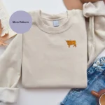 Standing Scottish Highland Cow Sweatshirt, Scottish Highland cow sweatshirt, embroidered cow jumper, unisex animal-themed sweatshirt, cow lover gift idea, countryside-inspired clothing, stylish embroidered sweater, highland cow lover apparel, farmers gift, cozy countryside fashion, embroidered Scottish jumper, unique cow lover gift, modern fitted sweatshirt.