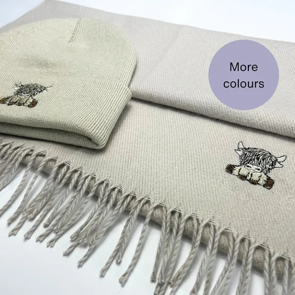 Scottish Highland cow scarf and hat set, embroidered winter accessories, Highland cow gift idea, cozy winter set, unisex embroidered hat and scarf, Scottish-themed fashion, embroidered cow scarf, embroidered cow beanie, stylish winter set, warm embroidered gifts, Scottish charm accessories, cold-weather essentials, Highland cow lover gift