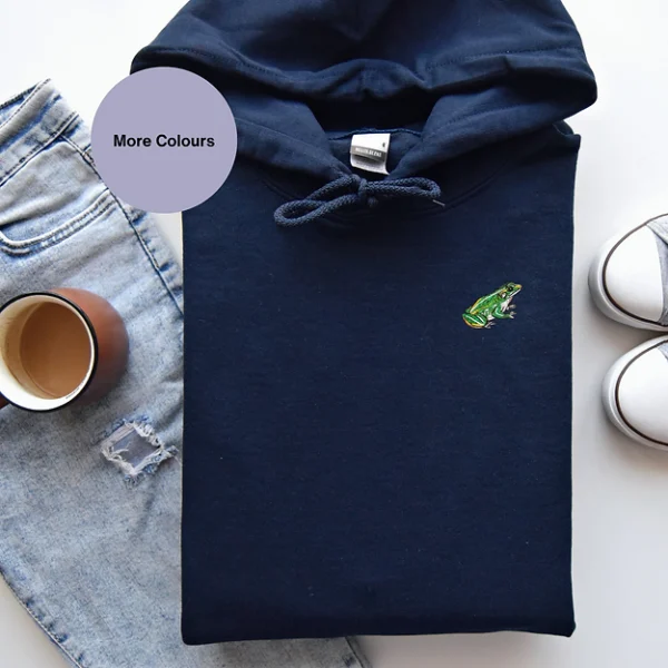 Frog Embroidered Hoodie, Organic Cotton Hoodie, Sustainable Hoodie, Frog Lover Gift, Unisex Frog Hoodie, Eco-Friendly Clothing, Warm Winter Hoodie, Frog Embroidery Design, Cozy Frog Hoodie, Woodland Adventure Hoodie, Recycled Polyester Hoodie, Frog-Themed Apparel, Comfortable Hoodie, Frog Gift Idea, Stylish Embroidered Hoodie, Brushed Fleece Hoodie, Animal Embroidery Hoodie, Frog Enthusiast Gift, Relaxation Hoodie, Unique Frog Clothing.