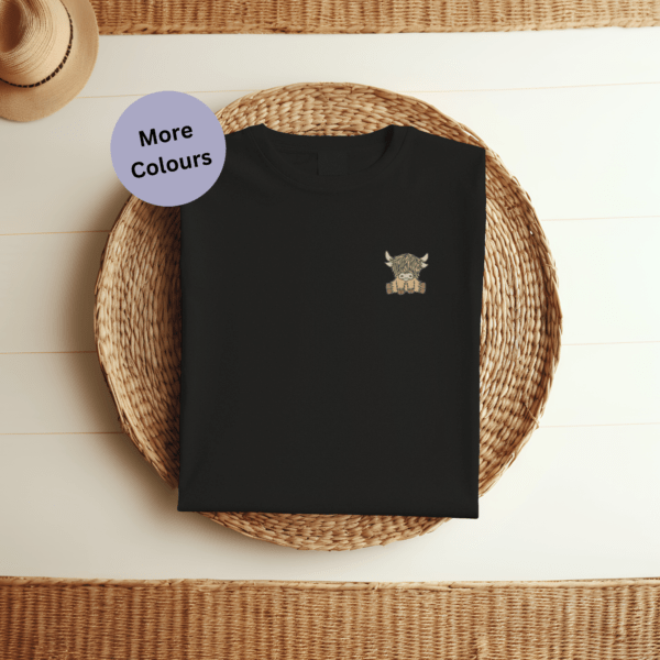 Scottish Highland Cow T-shirt, embroidered farm animal shirt, organic cotton cow tee, eco-friendly animal apparel, unisex embroidered T-shirt, sustainable fashion, animal lover clothing, farm animal gift, nature-inspired T-shirt, embroidered Highland Cow shirt, rustic animal design tee, Scottish Highland Cow Embroidered T-shirt, a must-have addition to any animal lover's wardrobe! Made from 100% organic cotton, this unisex embroidered T-shirt is not only comfortable but also environmentally friendly. The intricate embroidery features a charming Scottish Highland Cow design, showcasing its iconic long horns and shaggy coat. Our farm animal clothing collection is perfect for showcasing your love for nature and supporting sustainable fashion choices. Whether you're looking for a unique gift or simply want to add some personality to your everyday attire, this embroidered clothing piece is sure to make a statement. Stand out from the herd with our Scottish Highland Cow Embroidered T-shirt, perfect for both men and women alike!