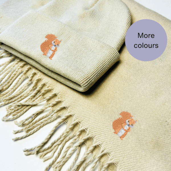 Squirrel  Scarf and Beanie Hat Set, A cozy winter scarf and beanie hat set featuring an intricately embroidered squirrel design. Available in red, natural, navy blue, black, and grey, this unisex set is perfect for squirrel lovers, offering warmth and style for chilly days