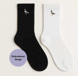 lose-up of embroidered pigeon design on cozy cotton crew socks